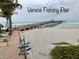 View of Venice Fishing Pier extending over the beach and into the ocean at 9118 Coachman Dr, Venice, FL 34293