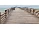 Wooden planks and railings leading down Venice Fishing Pier at 9118 Coachman Dr, Venice, FL 34293