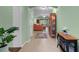 Inviting living room with neutral colors, tile floor, and access to the outdoors at 9118 Coachman Dr, Venice, FL 34293