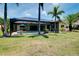 The expansive backyard features a pool at 915 S Doral Ln, Venice, FL 34293
