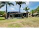 The expansive backyard features a pool at 915 S Doral Ln, Venice, FL 34293