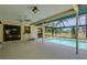 Inviting screened-in pool area with views of lush greenery and open skies at 915 S Doral Ln, Venice, FL 34293