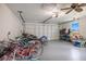 Spacious garage with ample storage for bikes and gear, providing an organized space for hobbies and equipment at 9277 Saint Catherine Ave, Englewood, FL 34224