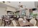 The on-site restaurant features tables, bar seating, high ceilings, and views to the outside at 10213 Staggerbush Dr # 202, Venice, FL 34293
