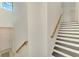 Staircase with bright natural light from large windows at 10213 Staggerbush Dr # 202, Venice, FL 34293