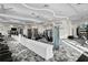 Bright, airy gym features modern equipment, inspiring motivational wall art, and serene natural light at 10367 Abaco Falls Dr, Englewood, FL 34223