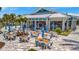 Outdoor dining area at High Tide Bar & Grill with ample seating, bar and view at 10367 Abaco Falls Dr, Englewood, FL 34223