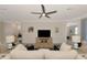 Comfortable living room features a ceiling fan, neutral decor, and an inviting atmosphere at 10789 Tarflower Dr # 202, Venice, FL 34293