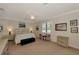 Relaxing main bedroom featuring a cozy bed, soft lighting, and a serene ambiance for restful nights at 10789 Tarflower Dr # 202, Venice, FL 34293