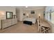 Spacious main bedroom with soft natural light, offering a peaceful retreat with ample closet space and calming decor at 10789 Tarflower Dr # 202, Venice, FL 34293