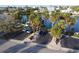 Aerial view featuring parking and boat docks at a waterfront home at 1100 Tarpon Center Dr # 503 5C, Venice, FL 34285