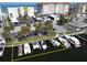 Aerial view featuring boat docks at a condo complex with ocean views at 1100 Tarpon Center Dr # 503 5C, Venice, FL 34285