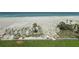 Enjoy private beach access and an entertainment area with serene ocean views from this stunning property at 1100 Tarpon Center Dr # 503 5C, Venice, FL 34285