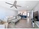 Bright living room with a modern design that seamlessly connects to the kitchen and dining spaces at 1100 Tarpon Center Dr # 503 5C, Venice, FL 34285