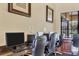A business center with multiple computer stations and comfortable seating for residents' convenience at 11103 Batello Dr, Venice, FL 34292