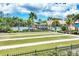 Image of Lawn Bowling in community with palm trees and seating at 11103 Batello Dr, Venice, FL 34292