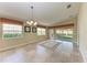 Lovely dining room with tile flooring, natural light and backyard views at 11624 Garessio Ln, Sarasota, FL 34238