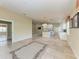 Spacious living room with tile floors, backyard views, and open concept layout at 11624 Garessio Ln, Sarasota, FL 34238