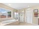 Bright bathroom with a large soaking tub, glass shower, and beige tile at 11986 Granite Woods Loop, Venice, FL 34292