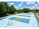 Outdoor hockey court featuring smooth surface, nets, and surrounding fencing for safe community sports at 11986 Granite Woods Loop, Venice, FL 34292