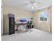 Bright office with a computer and chair, featuring lots of room and neutral carpeting at 11986 Granite Woods Loop, Venice, FL 34292