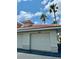 Garage doors under red tile roof at 1204 L Pavia Blvd # 1204, Venice, FL 34292