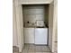 Laundry room with white washer and dryer at 1204 L Pavia Blvd # 1204, Venice, FL 34292