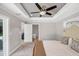 Primary suite featuring an ensuite bathroom with tub at 1228 Pineland Ave, Venice, FL 34285