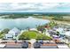 Aerial view of a community with a waterfront and various commercial and recreational areas at 12390 Wellen Golf St # 203, Venice, FL 34293