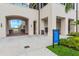 Entrance to the offices at Wellen Park, featuring a covered walkway and outdoor seating area at 12390 Wellen Golf St # 203, Venice, FL 34293