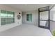 Relaxing outdoor space featuring two windows and door at 12390 Wellen Golf St # 203, Venice, FL 34293