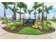 Sign identifying the location as Downtown Wellen Park, surrounded by lush landscaping at 12390 Wellen Golf St # 203, Venice, FL 34293