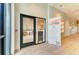 Inviting spa entrance featuring glass doors and a promotional display for various premium treatment options at 12390 Wellen Golf St # 203, Venice, FL 34293