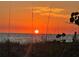 Beautiful beach sunset view offering gorgeous orange skies and tranquil ocean waves at 12390 Wellen Golf St # 203, Venice, FL 34293