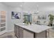 Kitchen island offering a view of the open-concept living space at 12871 Cinqueterre Dr, Venice, FL 34293