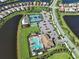 Stunning aerial view showcases prime real estate location near the lake at 13016 Rinella St, Venice, FL 34293