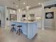Stylish kitchen with stainless steel appliances and bright lighting at 13016 Rinella St, Venice, FL 34293