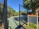 Outdoor basketball court, fenced in, with posted rules for residents and their guests at 13056 Steinhatchee Loop, Venice, FL 34293