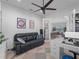 This bright office features a large sofa and attached desk at 13056 Steinhatchee Loop, Venice, FL 34293