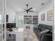 Home office featuring built-in shelving, and an attached desk at 13056 Steinhatchee Loop, Venice, FL 34293