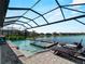 Stunning lake view from the screened pool and spa area at 13056 Steinhatchee Loop, Venice, FL 34293