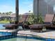 Comfortable wicker lounge chairs near the pool and spa at 13056 Steinhatchee Loop, Venice, FL 34293