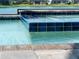 Close-up of the in-ground spa and pool at 13056 Steinhatchee Loop, Venice, FL 34293
