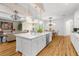 Spacious kitchen flows into the living area and dining area, perfect for entertaining at 13280 Campanile Ct, Venice, FL 34293