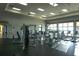 Well-equipped fitness center with modern exercise machines and plenty of natural light at 136 Positano Trl, Nokomis, FL 34275