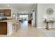 Open-concept living area connects seamlessly to the kitchen and Gathering room, perfect for gatherings at 13634 Vancanza Dr, Venice, FL 34293