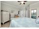 Bright main bedroom featuring ample storage and a calming color scheme at 13634 Vancanza Dr, Venice, FL 34293