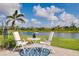 Patio with scenic water views, ideal for enjoying the outdoors at 13634 Vancanza Dr, Venice, FL 34293