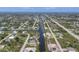 Expansive aerial view of a waterfront community with canal access at 14398 Fort Worth Cir, Port Charlotte, FL 33981