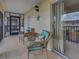 Balcony featuring comfortable seating and a view of the surrounding property at 1531 Placida Rd # 202 Building 9, Englewood, FL 34223